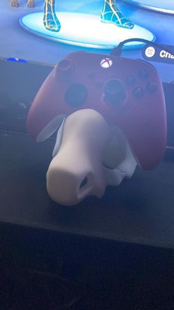 This is a Q bone controller holder stand and yes, I make a different characters