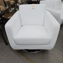 Chair white Leatherette SwivelWe are located at 2811 East Bell road. Another Time Around Furniture.