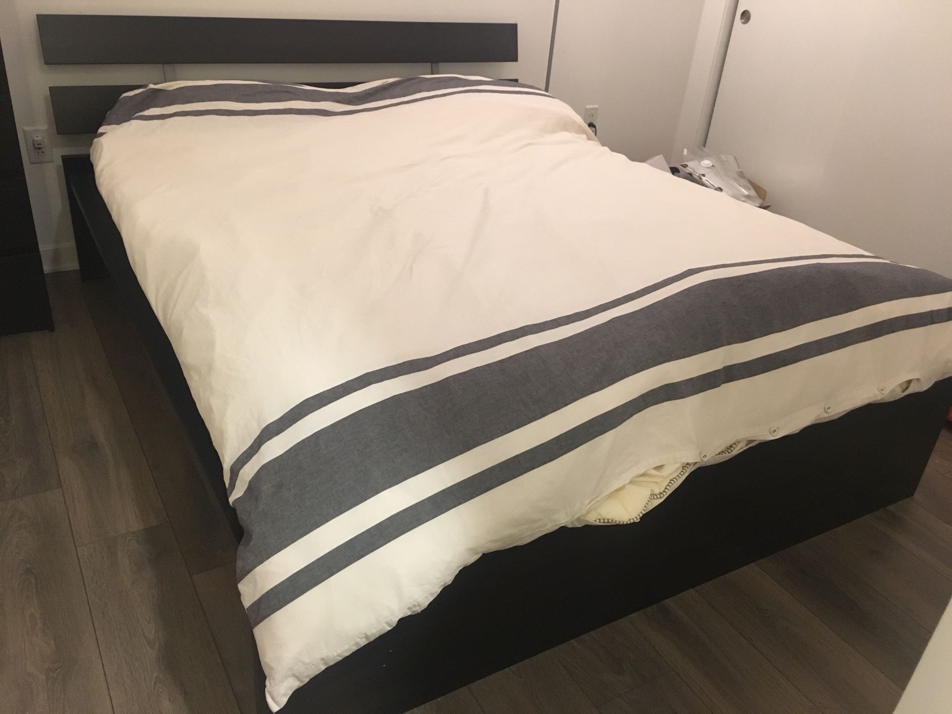 Supper comfortable IKEA queen bed and mattress. Moving sale.