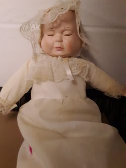 Old glass doll