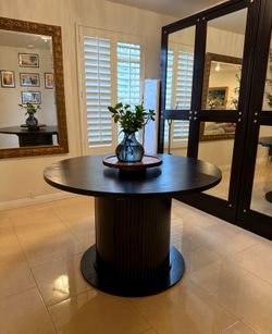 Black Round Pedestal Dining Table with Storage