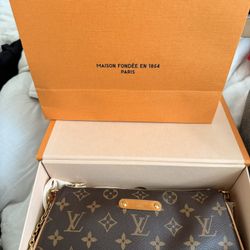 Louis Vuitton  Pochette Eva