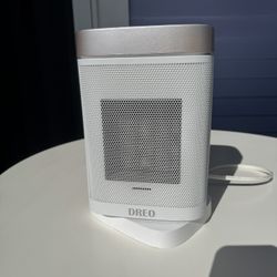 Compact rotating space heater