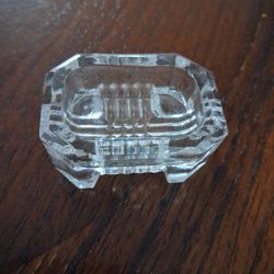 vintage octagonal clear glass open master salt cellar with stubby legs.
