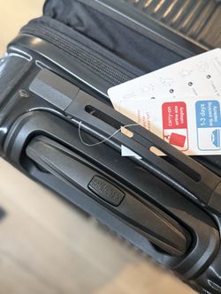 American Tourister Large Checkered Spinner Suitecase