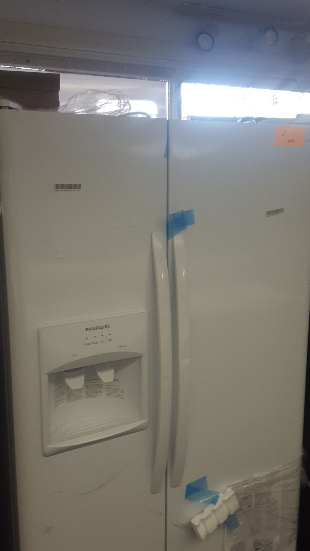 Frigidaire side by side white refrigerator