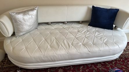White leather sofa set with Revolving chair  beautiful side table and wall decor