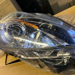 2001-203. MAZDA 3  Headlight Surround 
