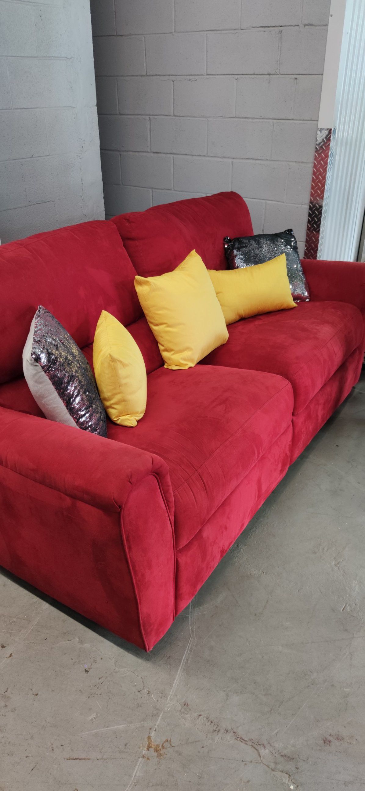 Red reclining sofa.. comfortable... very firm seats excellent condition