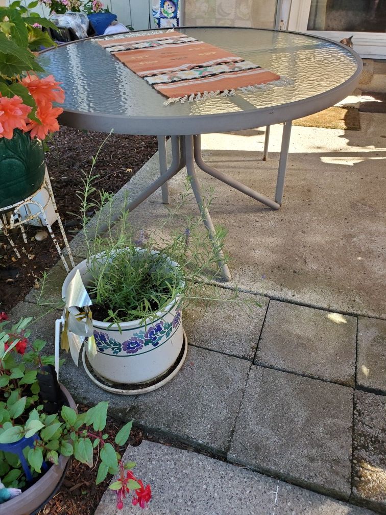 Frosted Glass And Metal Patio table and chairs