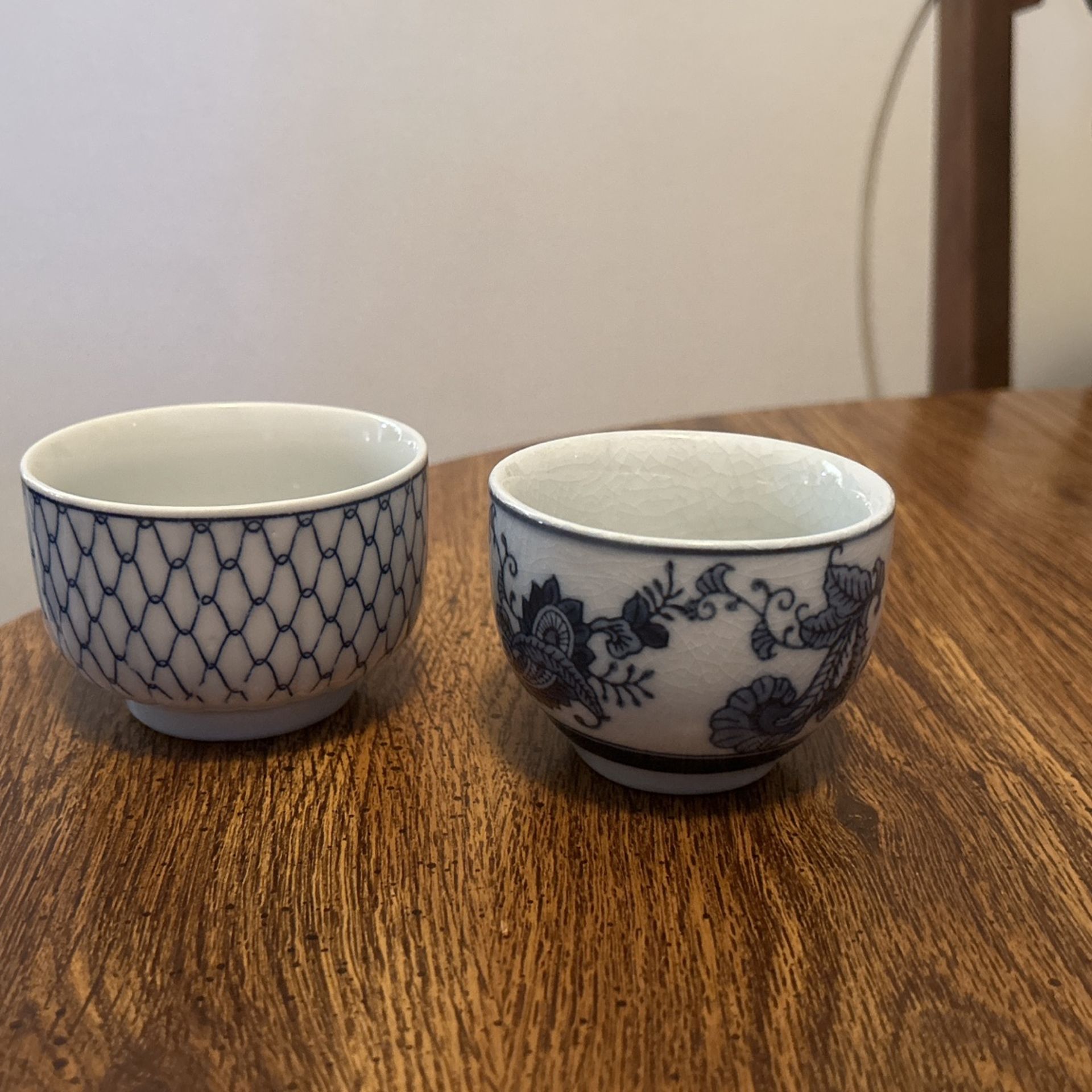 Three Small Blue And White Bowls