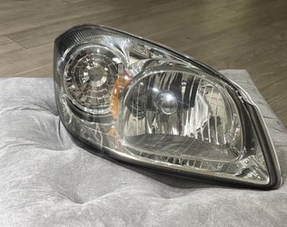 2007 Chevy Cobalt Passenger-side Headlight