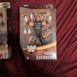 Signed Booker T And Eddie Guerrero Figures 