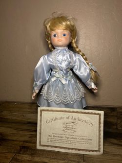 blue dress blonde doll with certificate