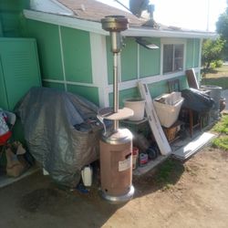 Good out side propane heater  it works it's just missing the top plate