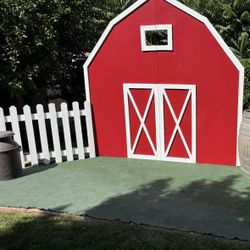 Wooden barn backdrop with legs to stand and white fence 