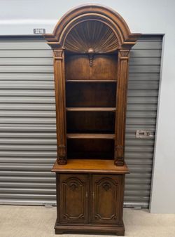 Beautiful condition French Provincial carved domed walnut bookcase. Two pieces ( top comes off base )  pick up in orting