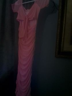 I'm selling a pink dress for a party, size M.