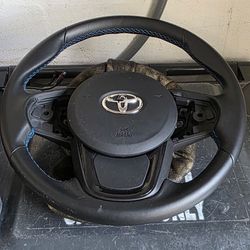 891 Steering Wheel And Side Panels 