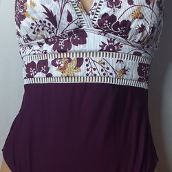 Purple white floral 1 piece swimsuit w/ cut out details size small