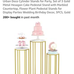 Set Of Three Pedestal Cylinder Stands With Marble Top