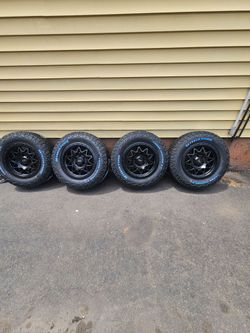 Brand new set of wheels and tires 18x9 offset 0 6x139.7