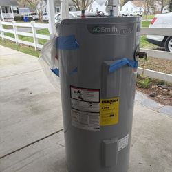 Electric  Hot Water Heater,  24 Inch Across, 48 Inc Tall