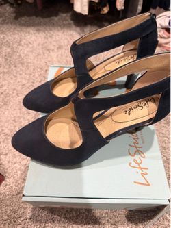 Navy blue suede heels size 9.