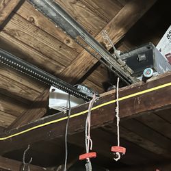 two Garage Door Openers. $60 For Both 