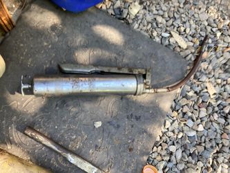 Lincoln high performance grease gun filled with royal purple grease