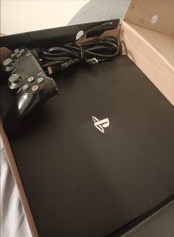 Sony PlayStation 4 Pro Console with Controller