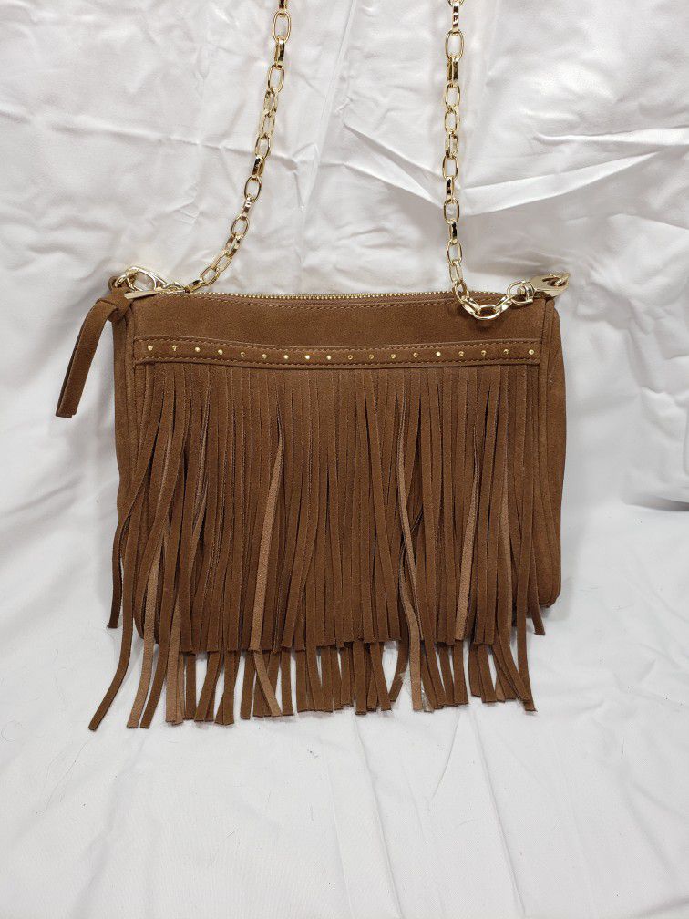Hoxis fringe small crossbody purse . 
This faux leather crossbody with top zipper closures, a faux suede leather fringe accent