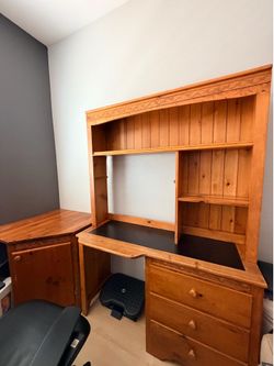 Wooden desk with corner cabinet and drawers