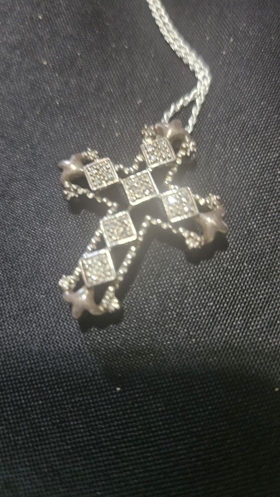 Silver with diamonds cross