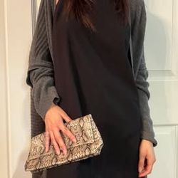 ESTĒE LAUDER snakeskin pattern clutch