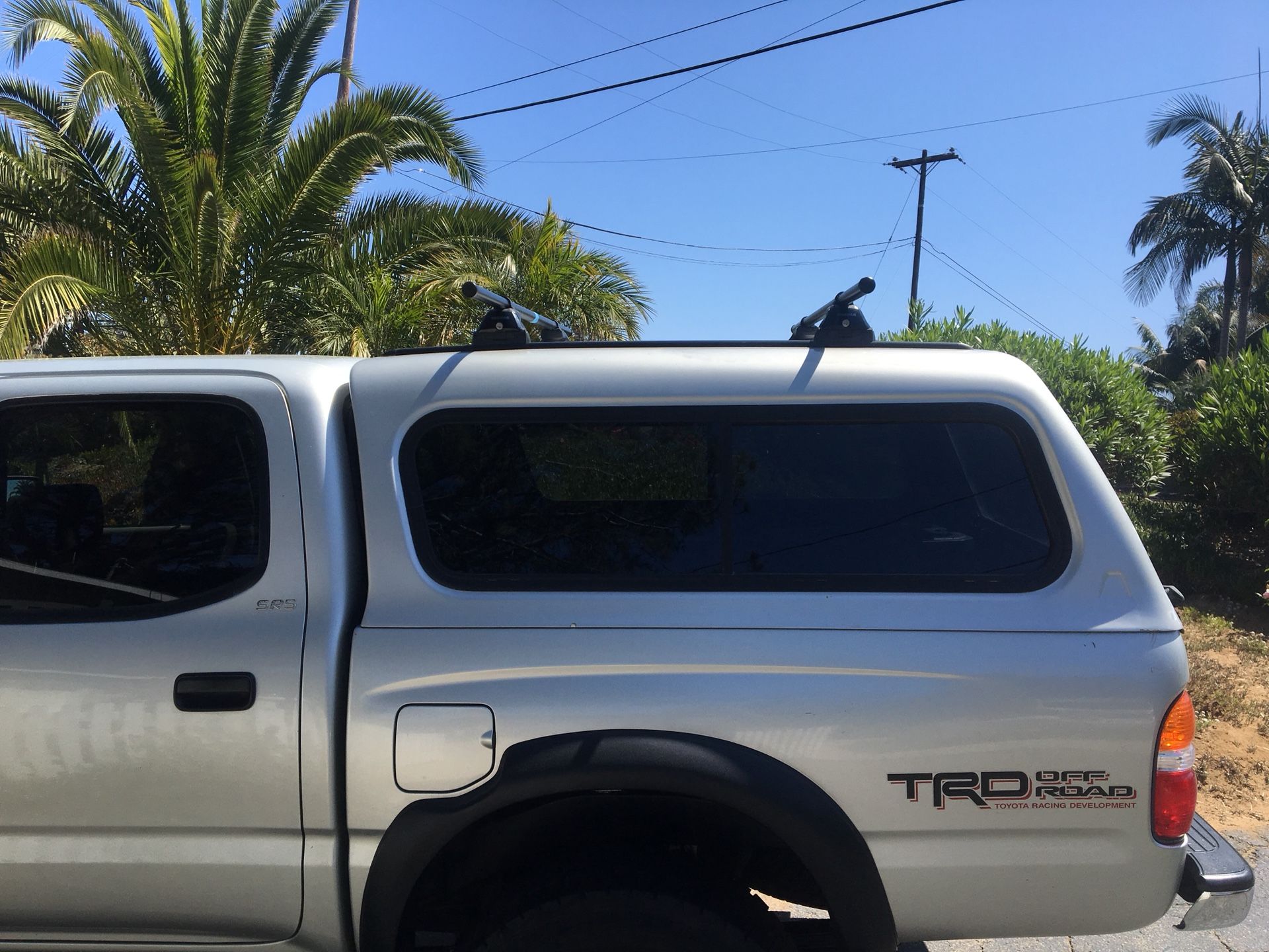 LEER Camper Shell Toyota Tacoma 1995 to 2004 first generation double cab OEM grey