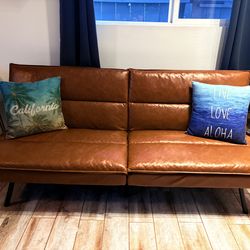 Faux brown, leather futon couch