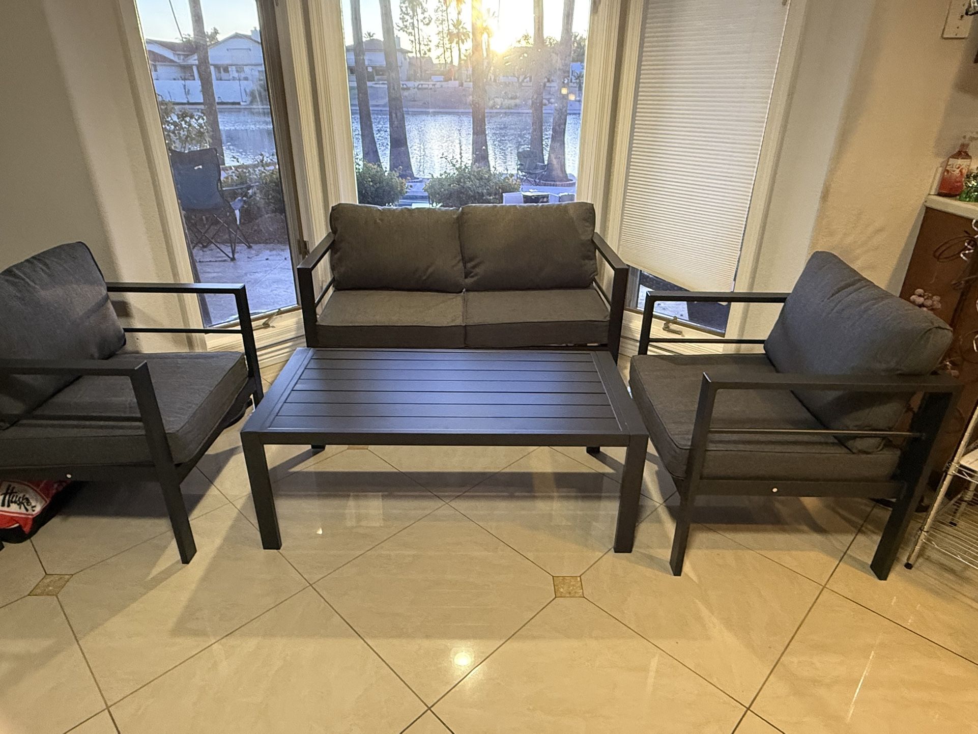 Brand new 4 Piece aluminum patio furniture set