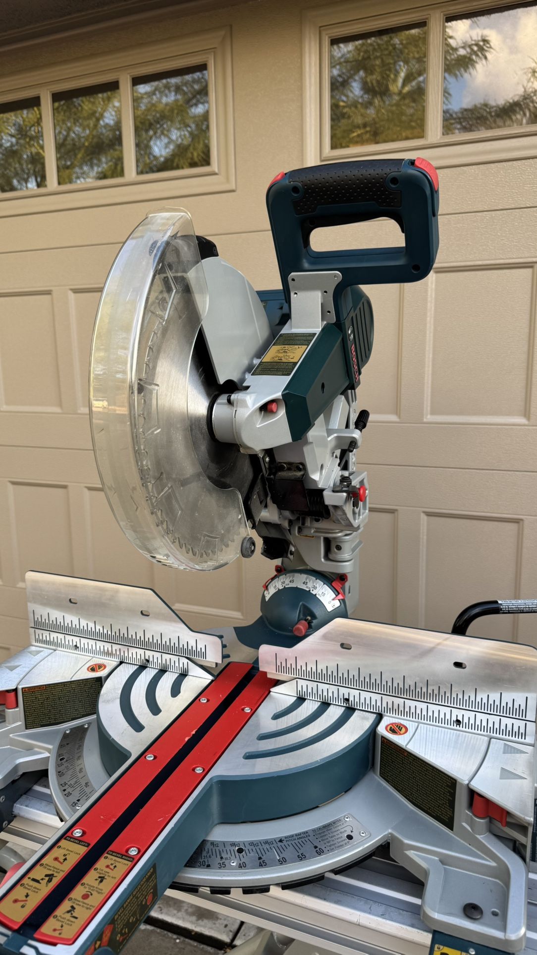 Bosch GCM12SD 12” Dual-Bevel Glide Miter Saw + T4B Gravity-Rise Stand — Excellent Condition