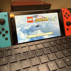 Nintendo switch (new condition) - Adult Owned)