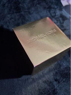 Michael Kohrs brand new gold watch