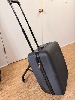 Mountain buggy ride along suitcase