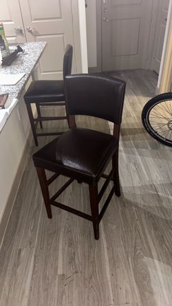 Set of leather bar chairs