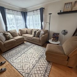 Living space sofa couch  with pillows.