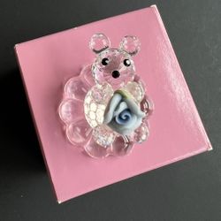 Vintage very rare teddy bear on flower holding a flower