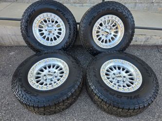 17" KMC w/ 33" Falken Wildpeak AT3 tires