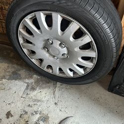 🚗 Set of 4 Used Tires with Rims – Good Condition