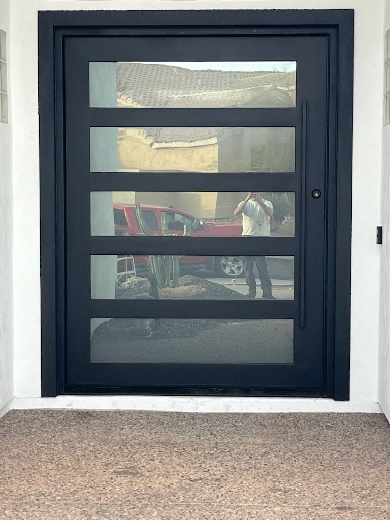 72x96. wrought. iron. pivot. doors