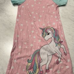 Pink nightgown with unicorn and star design