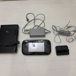 Nintendo Wii U Deluxe 32GB w/ 4 games, gamepad, and all original cords/accesories